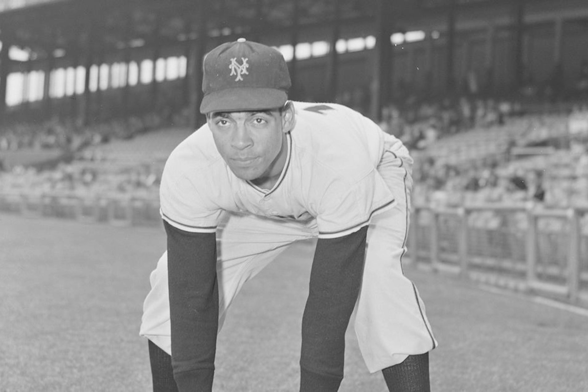 Former Major Leaguer Ozzie Virgil throws out the first pitch